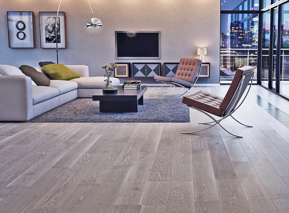 grey living room with brown wooden floor